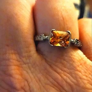 Silver ring with yellow stone Size 8